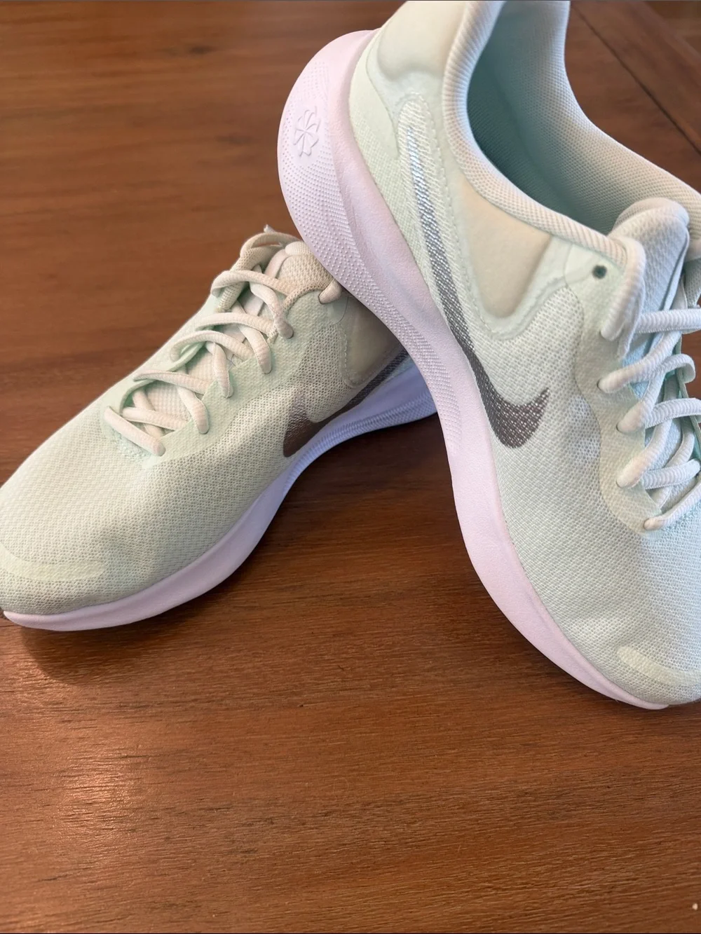 Nike Women's Seafoam Mint Running Sneakers with silver Swoosh